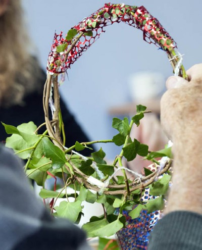Making a Christmas wreath with ivy