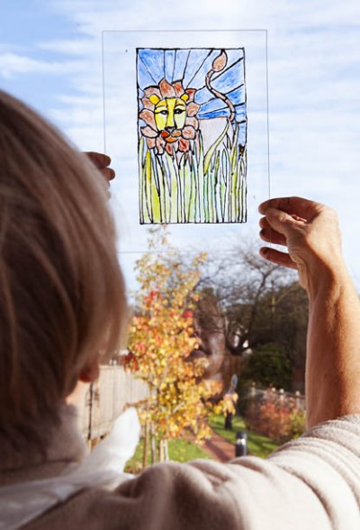 An image of a lion painted on glass