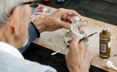 Sculpture of person in rowing boat